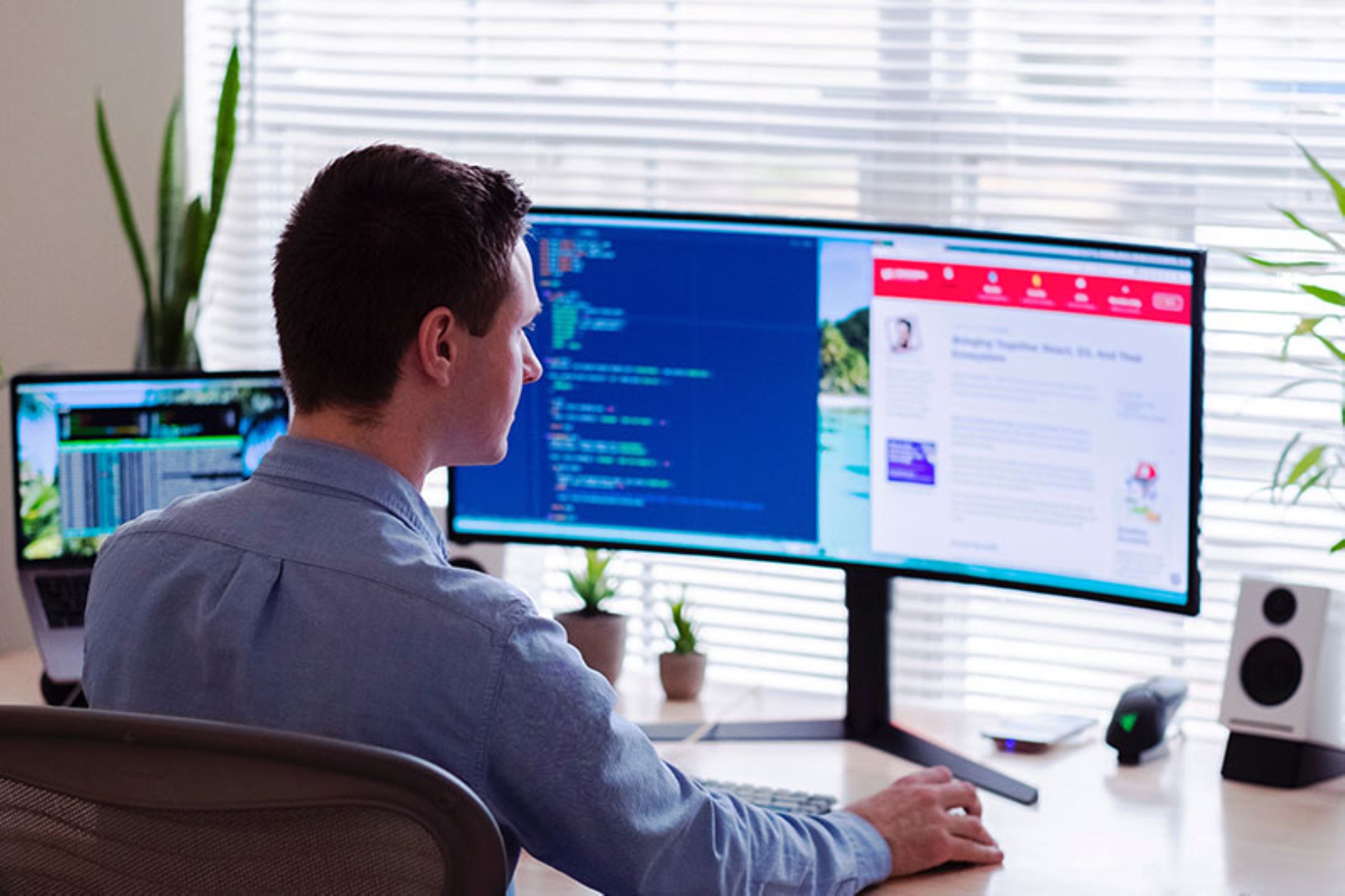 Person working at dual computer monitors reviewing data and processes for bookkeeping and workflow optimization through our services.
